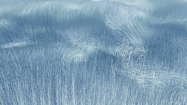 Abstract ice rime blue texture on glass