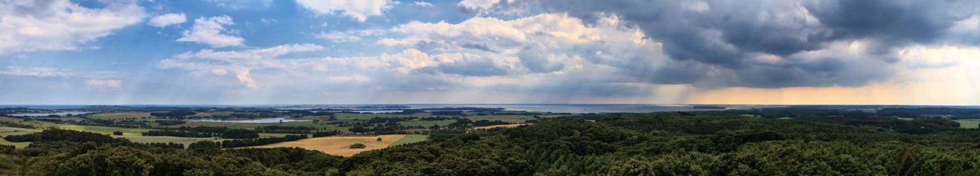 Island of Rügen,view of the forest of Lancken-Granitz (foreground),Greifswalder Bodden,island Vilm,Neuensiner See,Seedorf,Selliner See,Sellin,Having,Hagensche Wiek,Göhren and Thiessow