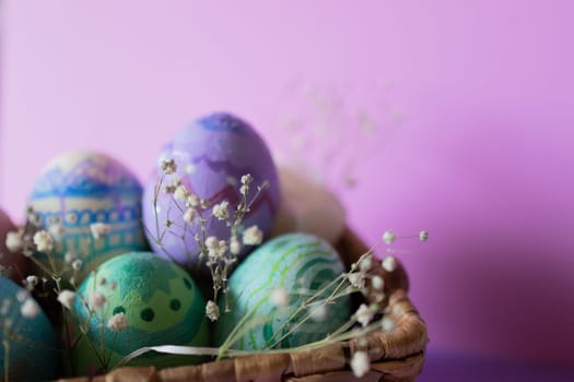 Homemade painted eggs.Pastel coloured Easter eggs .Horizontal real picture with copy space. Christian decoration. Colorful Easter eggs on the traditional religious day of Easter.