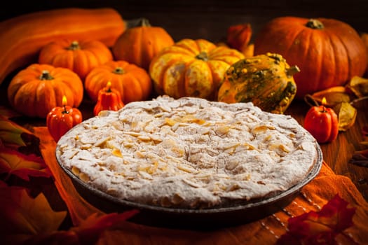 Apple pie for Thanksgiving with pumpkins