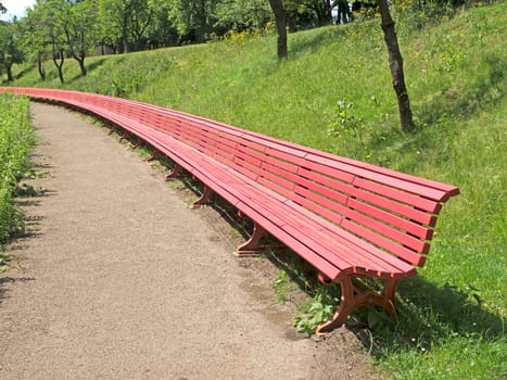 red bench in a park