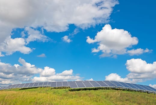 Solar power plant under a blue summer sky