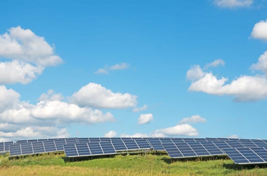 Solar power plant under a blue summer sky