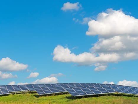 Solar power plant under a blue summer sky