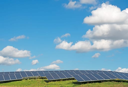 Solar power plant under a blue summer sky