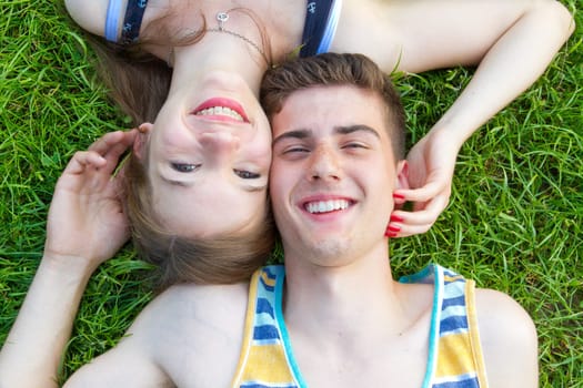 Young,happy couple in the grass