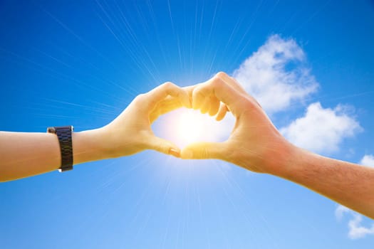 Finger heart and sun