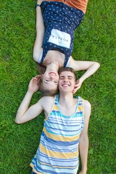 Young,happy couple in the grass