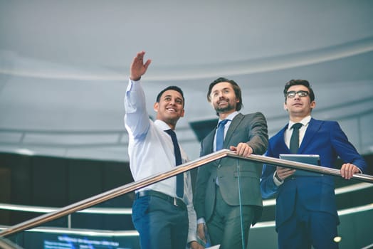 Group of successful businessmen discussing something