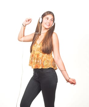 attractive young woman dances with headphones