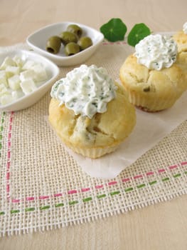 Cupcake with olives,feta cheese and herbal quark topping