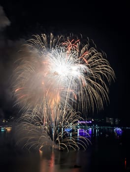 Aerial view of Pattaya city with firework at beach, Thailand