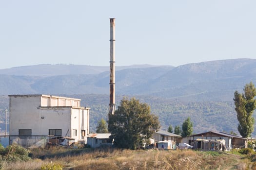 Shantytown near an a old Chimney