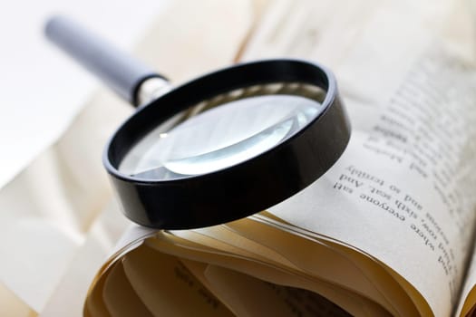 Magnifier with book pages