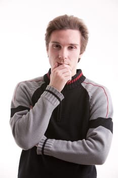 young good looking guy thinking about a new idea he had and about how can he make it reality