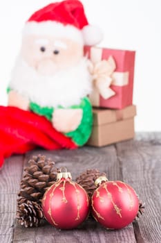 Christmas baubles and Santa Claus toy background