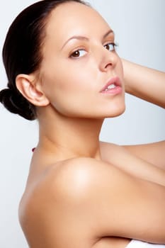 Beautiful brunette posing in front of camera
