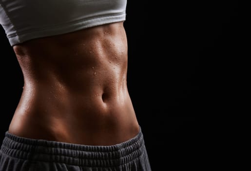 Wet torso of young woman wearing activewear