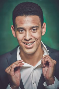 Handsome businessman in formalwear posing in front of camera