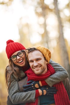 Cheerful dates looking at camera outdoors