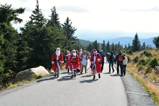 Santaclauses on the summit of the Brocken in the Harz National Park