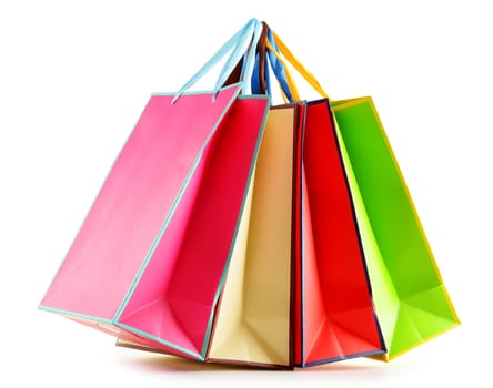 Colorful paper shopping bags isolated on white background