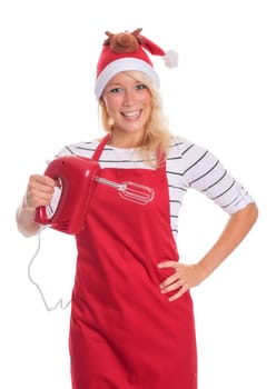 Woman with Christmas hat in apron holds a blender