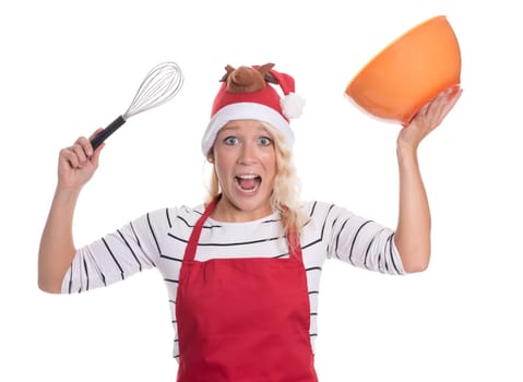 Excited Christmas woman in apron holds a bowl and a quirl