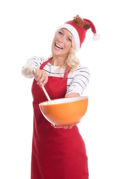 Christmas woman in apron with bowl and wooden spoon