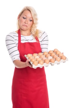 Woman with apron holds an egg pallet and pulls a snout