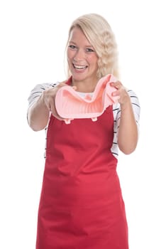 Woman in apron holds a silicone baking dish