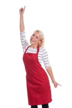 Housewife in red kitchen apron is cheerful and shows thumbs up