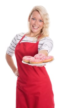 Housewife with apron offers doughnuts