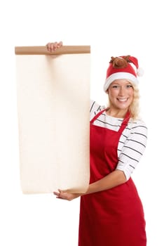 Christmas woman holds a roll of baking paper as advertising space