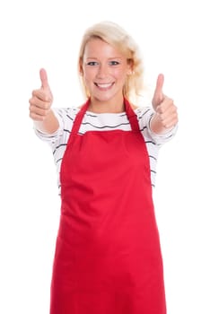 Housewife in red kitchen apron is cheerful and shows thumbs up