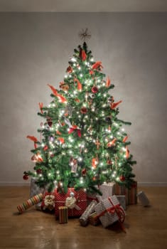 Beautiful illuminated christmas tree in a living room