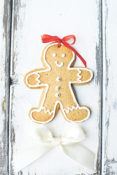 Gingerbread on white wooden background