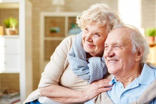 Affectionate and cheerful senior couple