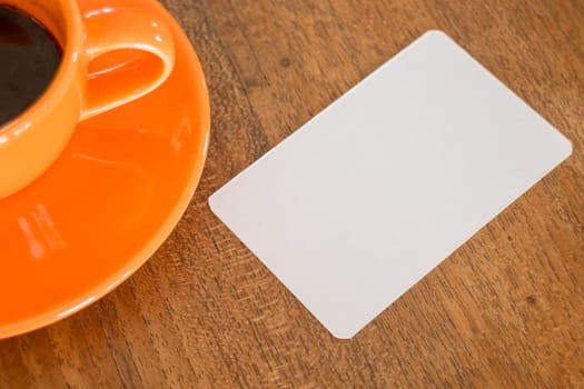 Blank business cards on wooden table, stock photo