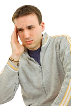 young casual man with a headache, isolated on white