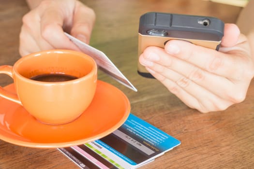 Hand holding smart phone online business, stock photo