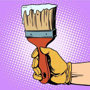 Painting brush in his hand pop art retro style. Painting brush in his hand