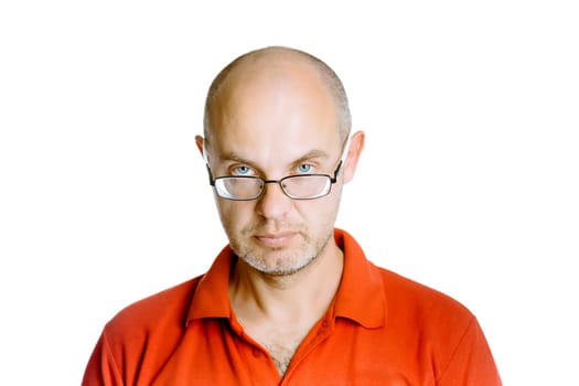Unshaven man in a red T-shirt. Studio. isolated