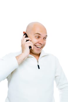 Bald man emotionally communicates by phone. Isolated on white. Studio