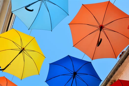 Umbrellas over a shopping street in Croatia