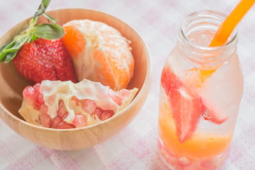 Infused water bottle of mix fruit refreshing drink, stock photo