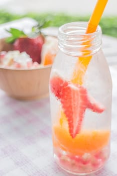 Infused water bottle of mix fruit refreshing drink, stock photo