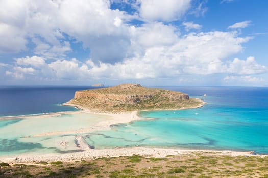 Breathtaking panorama of Balos beach and lagoon and Gramvousa island on Crete, Greece. Cap tigani in the center.