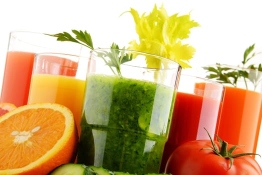 Glasses with fresh organic vegetable and fruit juices isolated on white. Detox diet