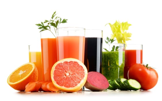 Glasses with fresh organic vegetable and fruit juices isolated on white. Detox diet